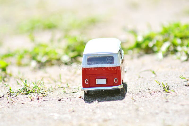 Red miniature toy bus close-up. Travel concept. stock photos Red miniature toy bus close-up. Travel concept. stock photos