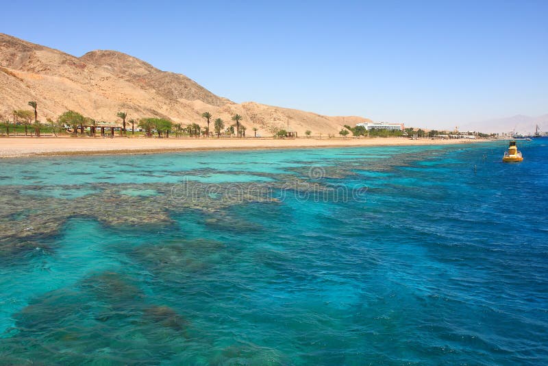 Red mountains and beautiful sea.