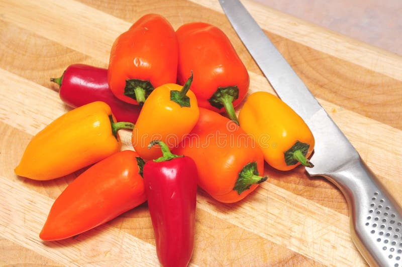 Red, Orange and Yellow Peppers Stock Image Image of green, garlic
