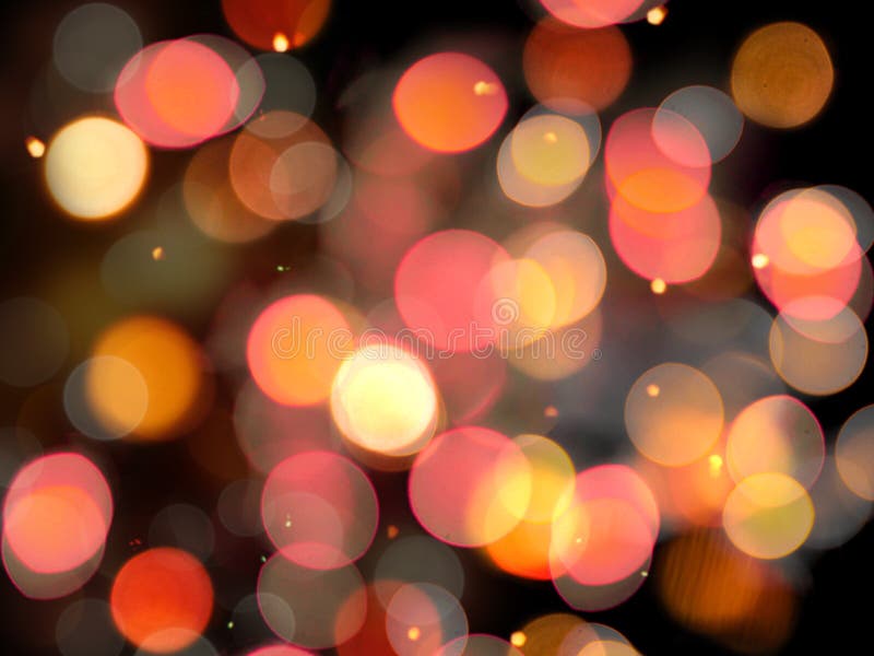 red orange and yellow soft glowing blurred lights abstract with sparkling effect on a black background