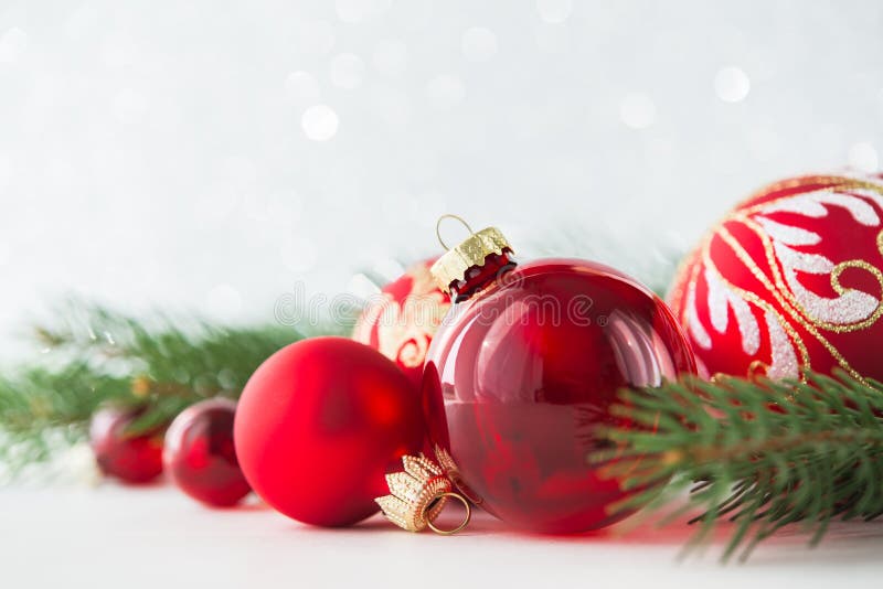 Red ornaments and xmas tree on glitter holiday background. Merry christmas card. Winter theme. Happy New Year. Space for text. Text greeting stock images, royalty-free photos and pictures