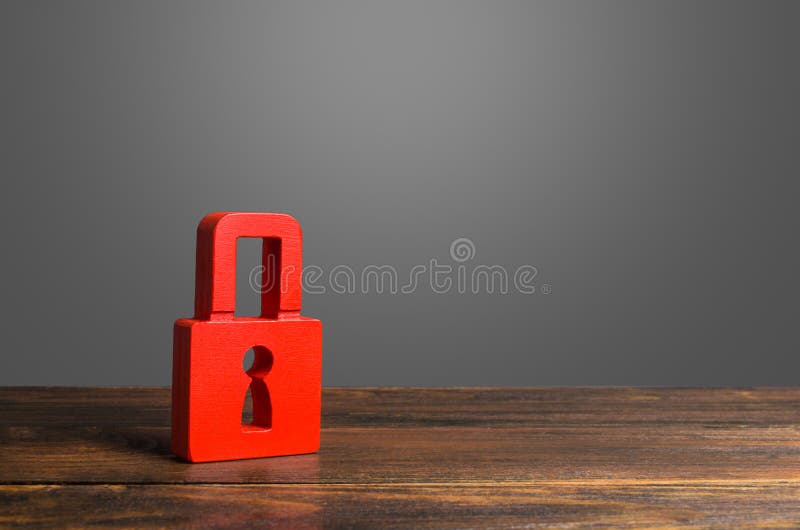 A red padlock. preservation of secrets, information and values. Protection and insurance. Hacking attack. Safety of personal data stock photography