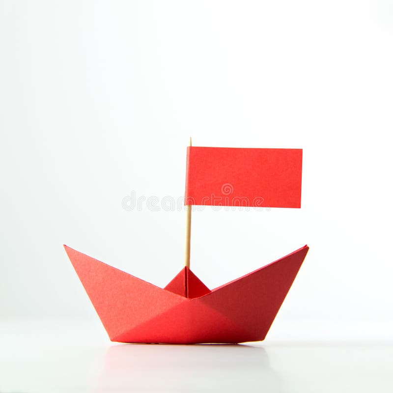 Red paper boat with flag