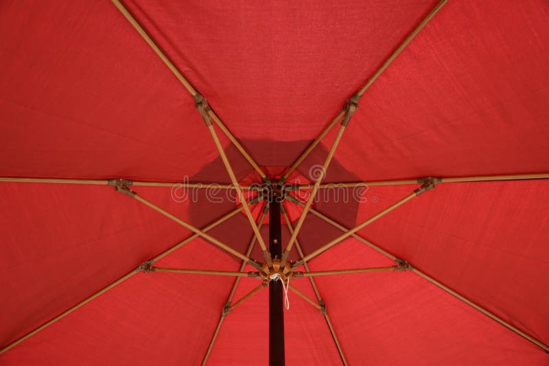 Yellow Patio umbrella stock photo. Image of green, coast 59348188
