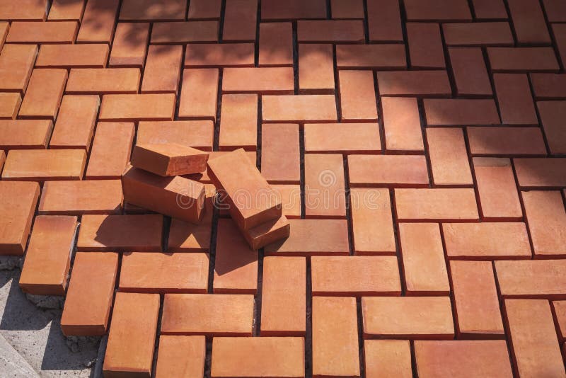 Red Paving Bricks on Pedestrian Sidewalk in Under Construction Stock