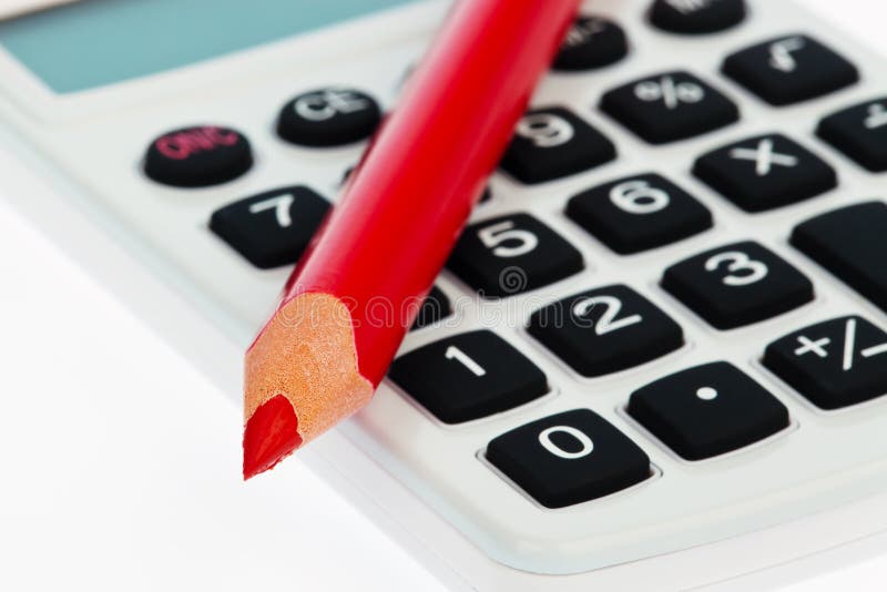 Red pencil and calculator