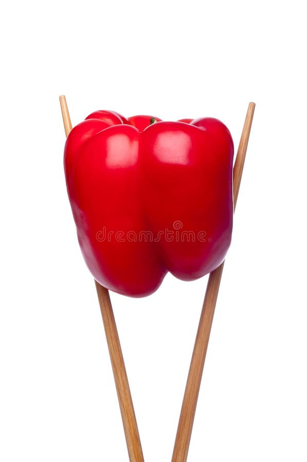 Red pepper in chopsticks