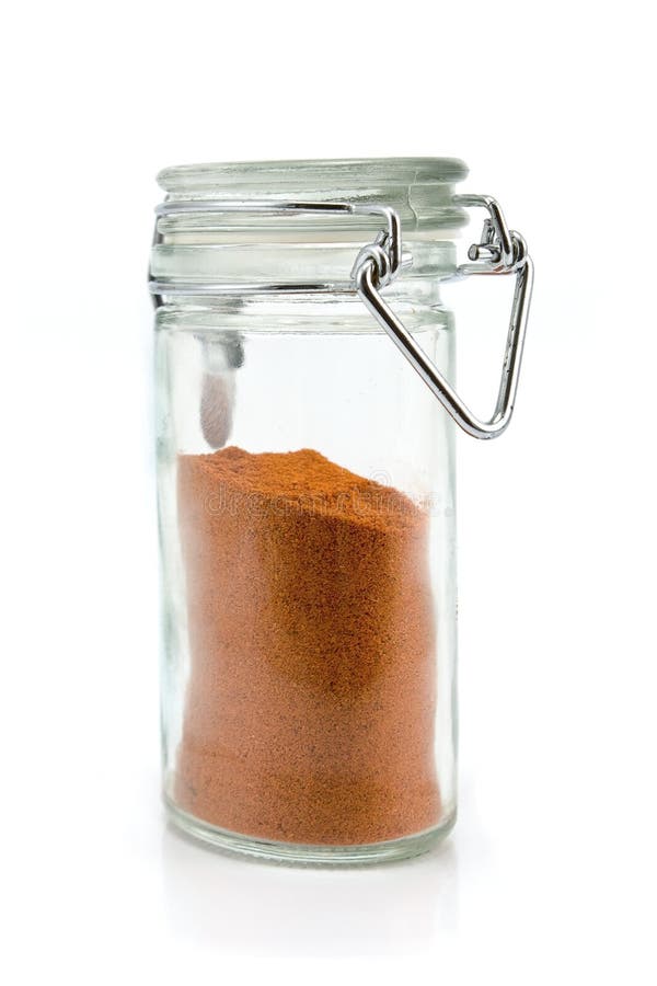Red pepper powder in jar stock image. Image of color 42480965