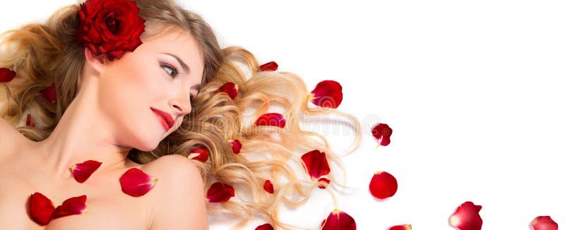 Red petals rose in hairstyle