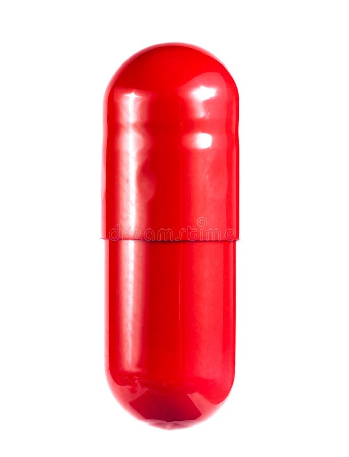 Red pill on a white background close-up