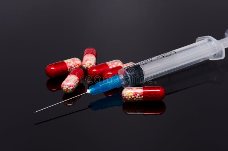 Red Pills And A Syringe Stock Image Image Of Backgrounds 37788249