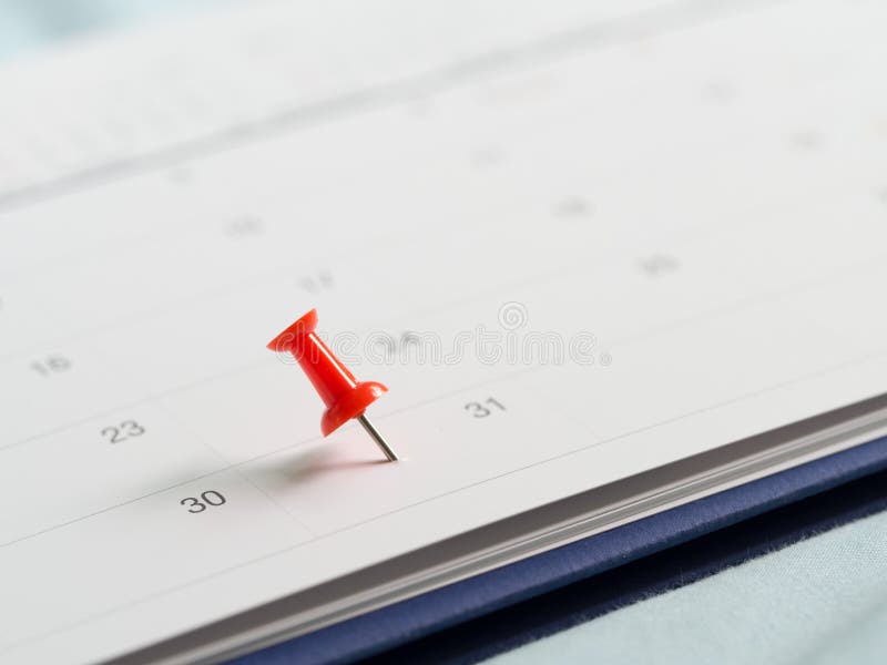 Red pin push on day 31 of end month on white calendar. Mark this day as salary date. Concept of meeting appointment reminder stock images Red pin push on day 31 of end month on white calendar. Mark this day as salary date. Concept of meeting appointment reminder stock images