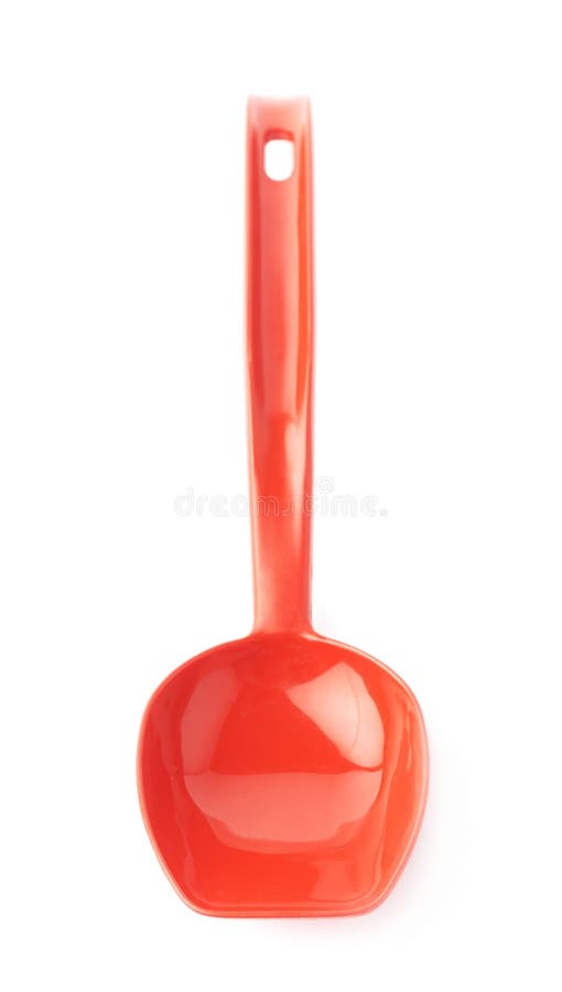 Red glossy plastic kitchen cooking scoop isolated over the white background. Red glossy plastic kitchen cooking scoop isolated over the white background