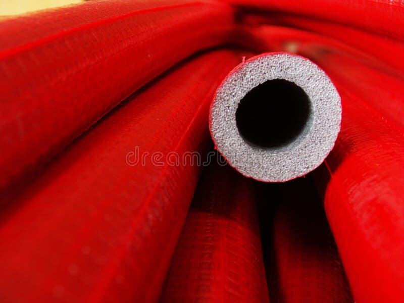 Red plastic pipes stock image. Image of build, striped 731821
