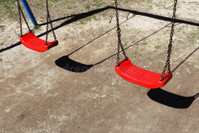 Red plastic swings stock photo. Image of rope, swing 89133892