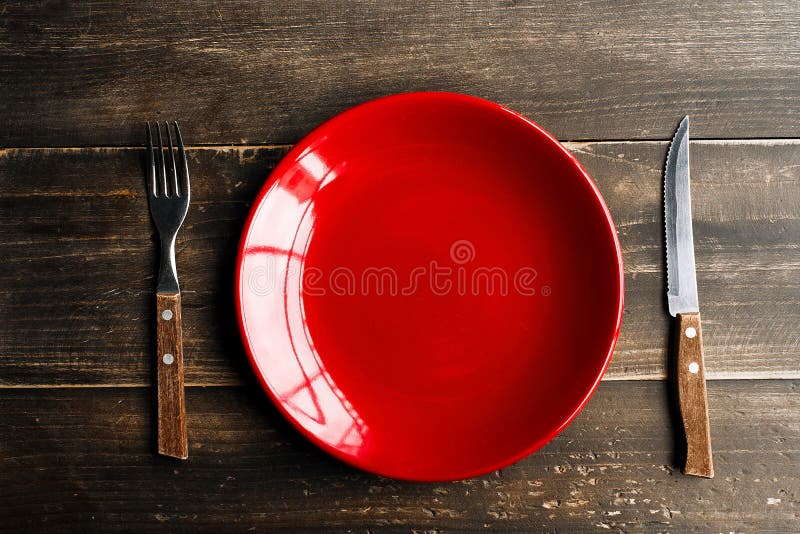 Red Plate on the Table with Knife and Fork Stock Image Image of fork