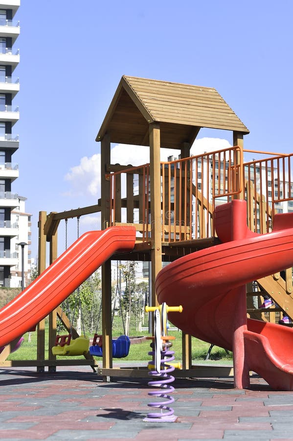 Red Playground Slide. stock photo. Image of female, meeting 197555012