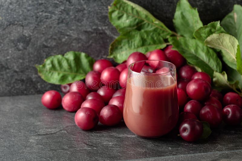 Red Plums and a Glass of Plum Juice Stock Photo Image of berry