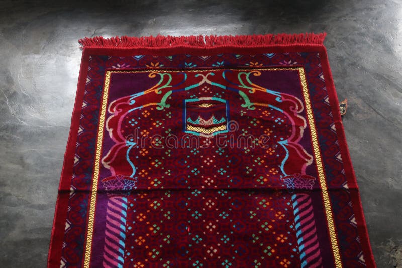 The Red Prayer Rug is Commonly Used for Muslim Worship Stock Image