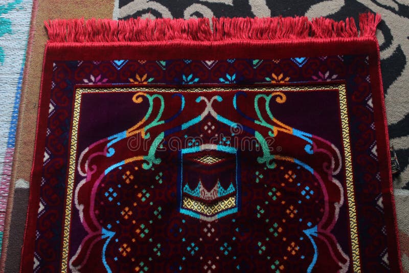 The Red Prayer Rug is Commonly Used for Muslim Worship Stock Image