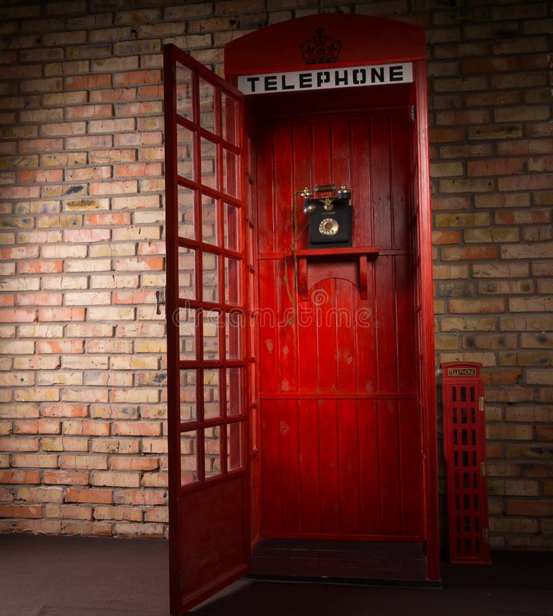 Red Public Telephone Booth with Open Door Stock Image Image of iconic