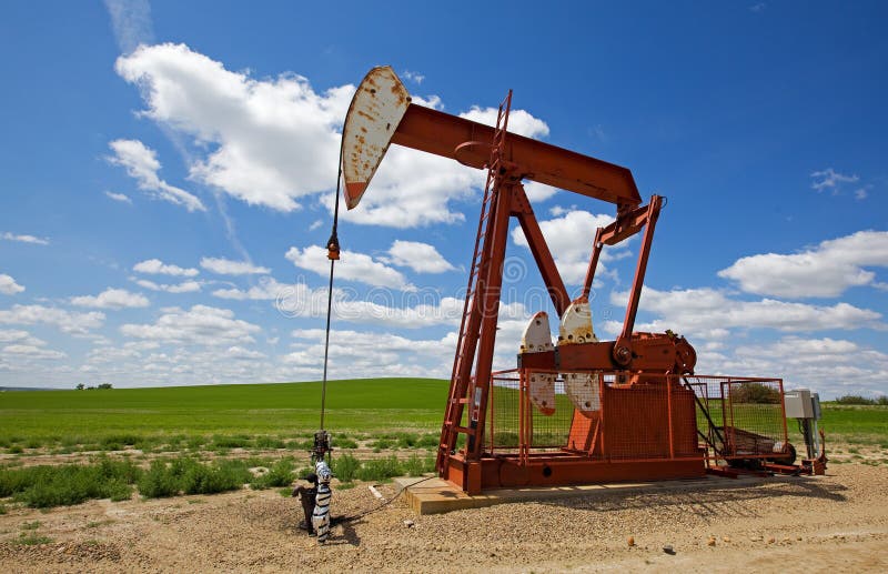 Red pump jack royalty free stock photography