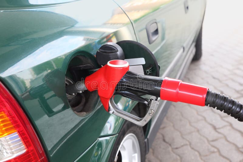 Red pump for refueling filling green car