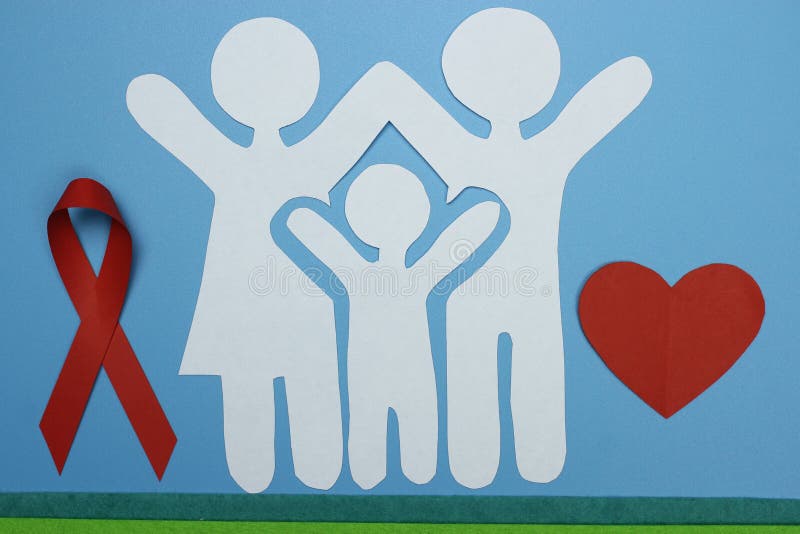 Red Ribbon and Paper silhouette of family. AIDS awareness symbol stock images Red Ribbon and Paper silhouette of family. AIDS awareness symbol stock images