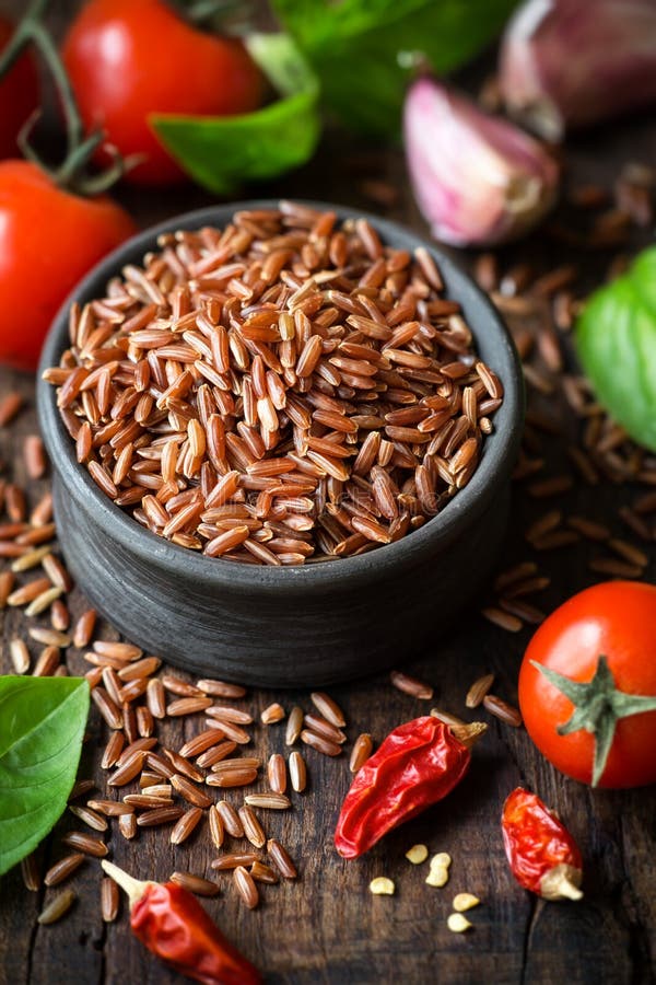 Red rice in a bowl stock image. Image of cereal, hulled 73503625