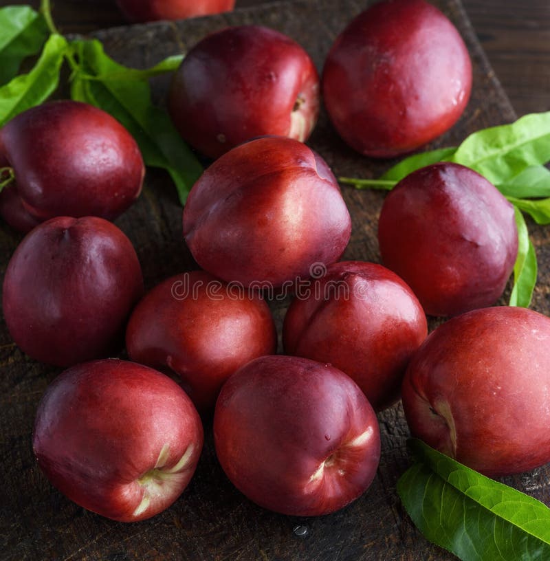 Red ripe peaches nectarine, close up