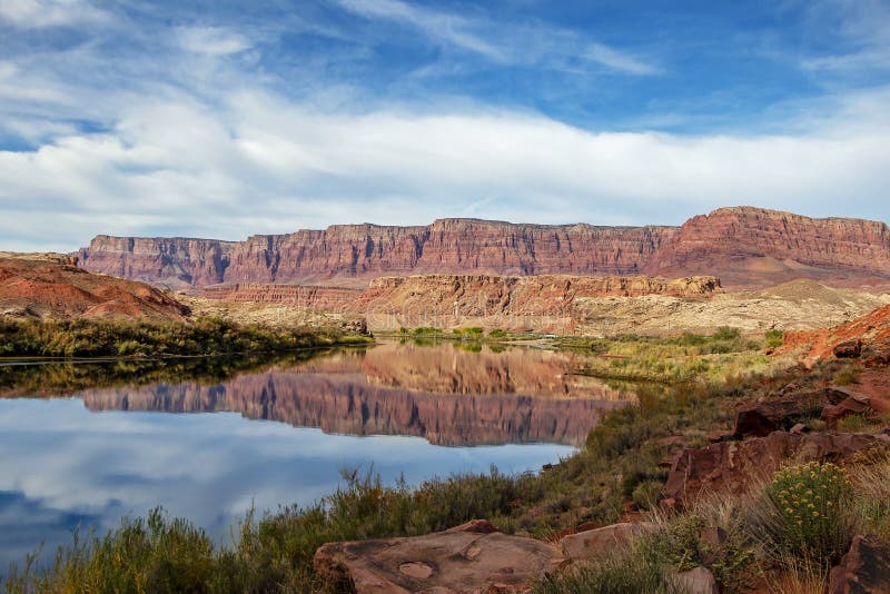 Red rock cliffs reflction on Colorado river near Lees Ferry AZ