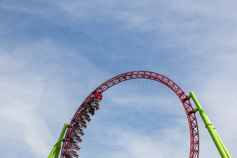 Red Roller Coaster Train on Top of Rail stock photo