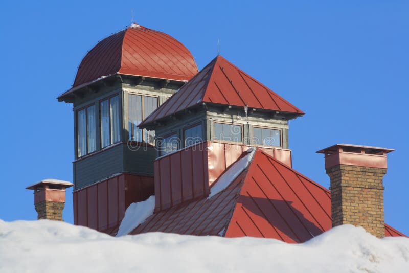 Red roof with towers stock photo. Image of building, architecture