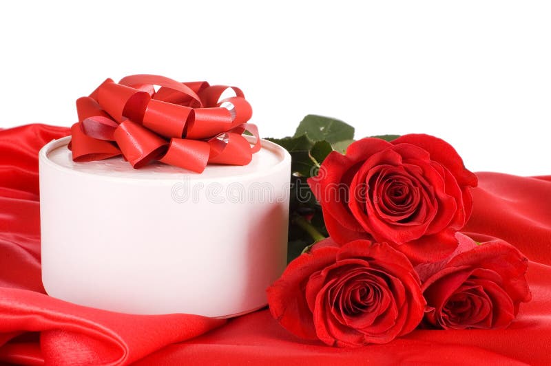 Red rose with a box with a gift