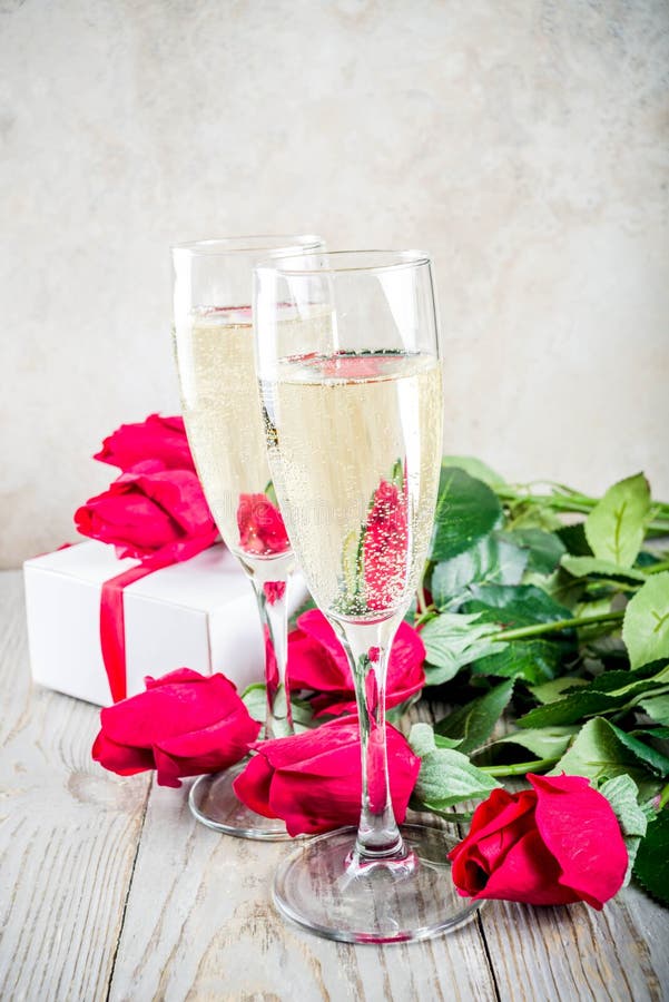 Roses And Champagne 56 Red Roses with Two Champagne Glasses Stock Image - Image of anniversary