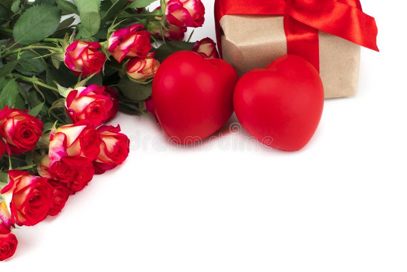 Red roses and Valentine`s day hearts and gift on white backgrou