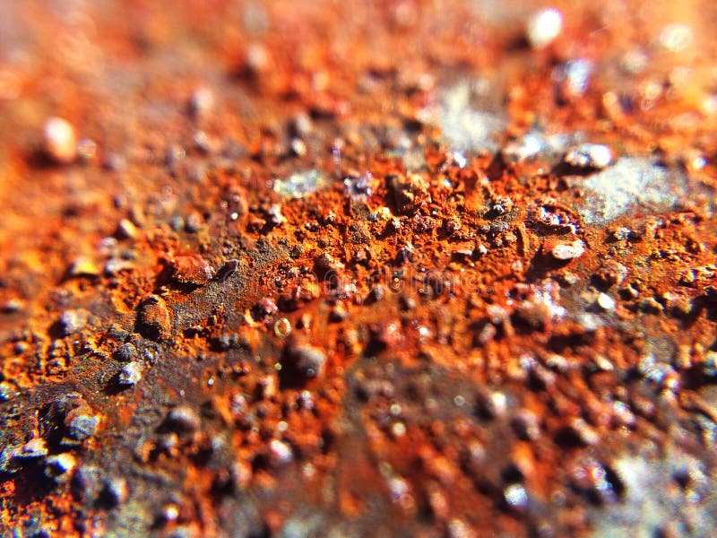 Red rusty metall sheet with grungy texture. Weathered rust macro photo stock images