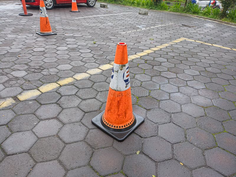 Red Safety Cone in the Parking Lot Outside the Mall Stock Photo Image