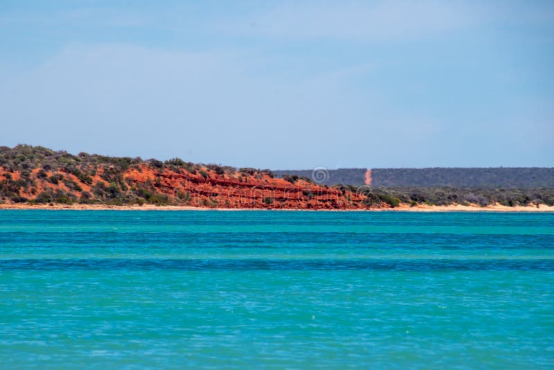 Red Sand Stone Cliffs at the Beach of Shark Bay Australia Stock Image