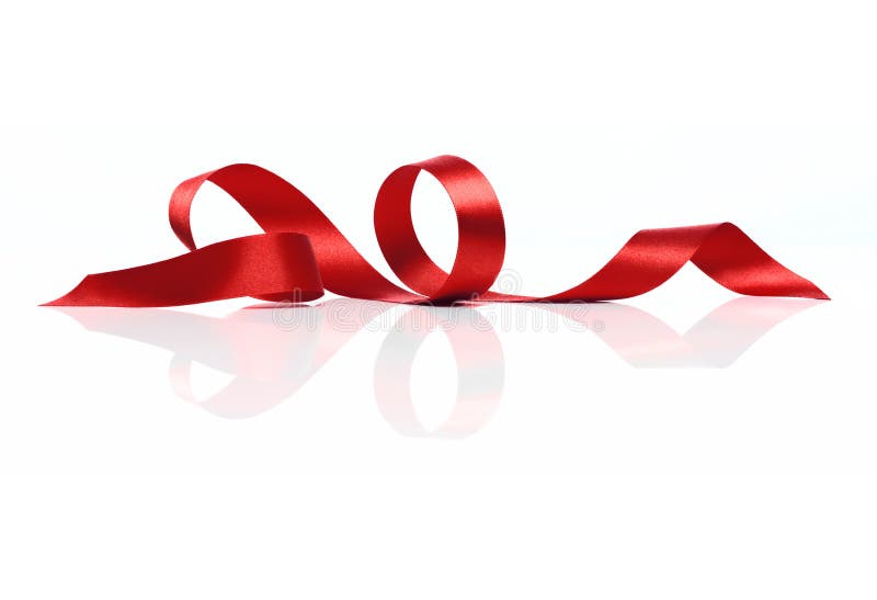 Red Satin Ribbon Twirl. Isolated curl of delicate red satin ribbon on white reflective background