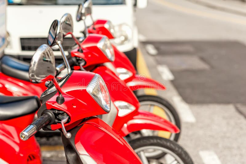 Red scooters parked in rows. stock image Red scooters parked in rows. stock image