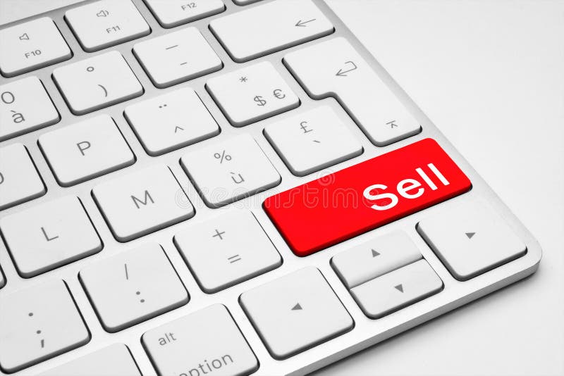 Red Sell button on a white keyboard isolated on a white background. Keyboard sell stock images, royalty-free photos and pictures