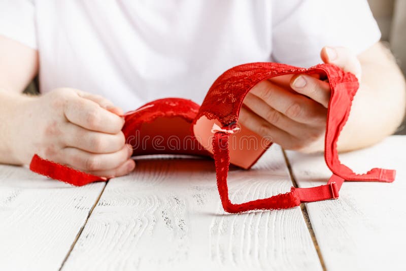 Red lace bra in hands stock photo. Image of breast, lingerie 179221022
