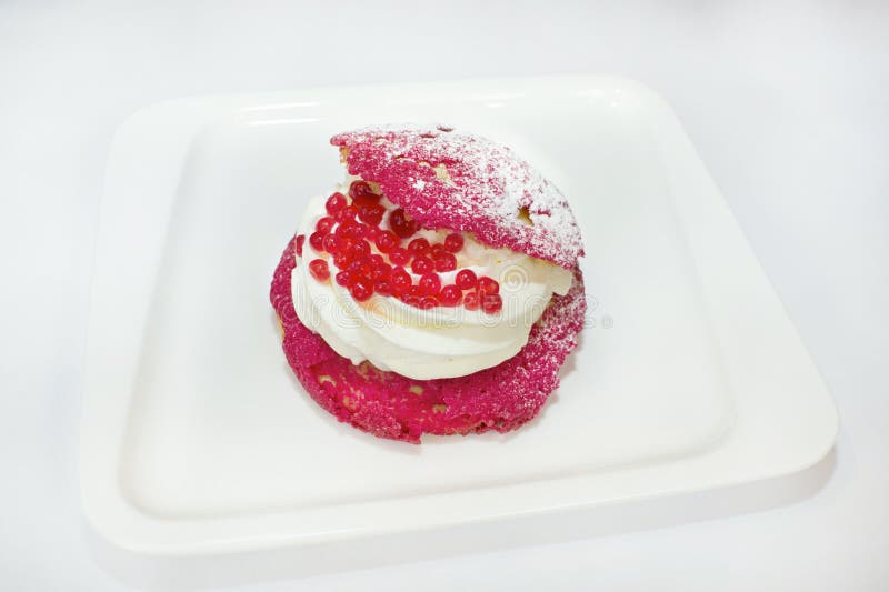 Red Shell Cake with Whipped Cream and Marmalade in the Form of Fish Roe