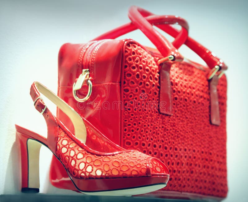 red shoes and clutch bag