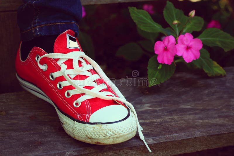 red converse low on feet