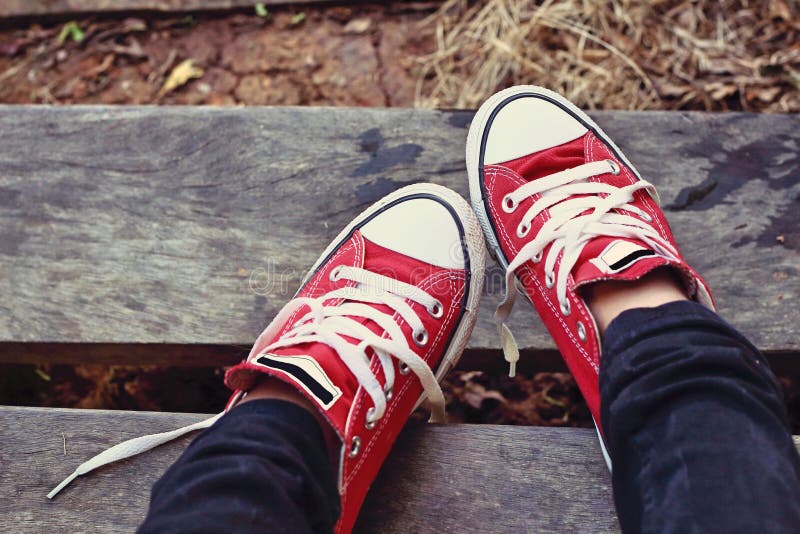 A Red Shoes On The Ground Stock Photo, Picture and Royalty Free