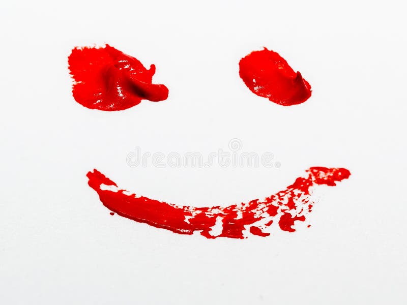 Smiley Face Made From Red Paint On A Piece Of Paper. Smiley Face Made From Red Paint On A Piece Of Paper