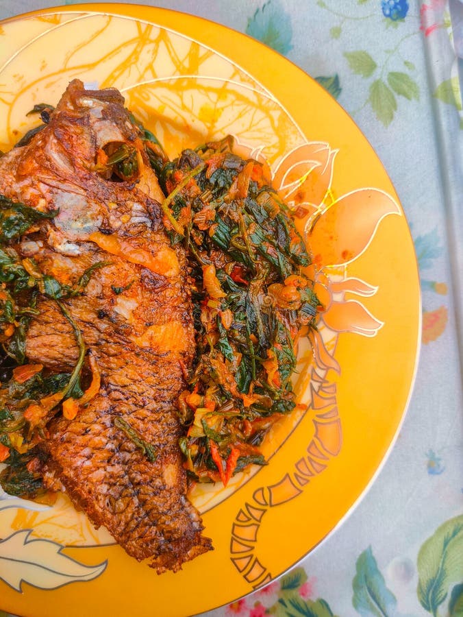 Red Snapper Fish Cooked with Spicy Sambal, and Green Onions, Tomatos ...