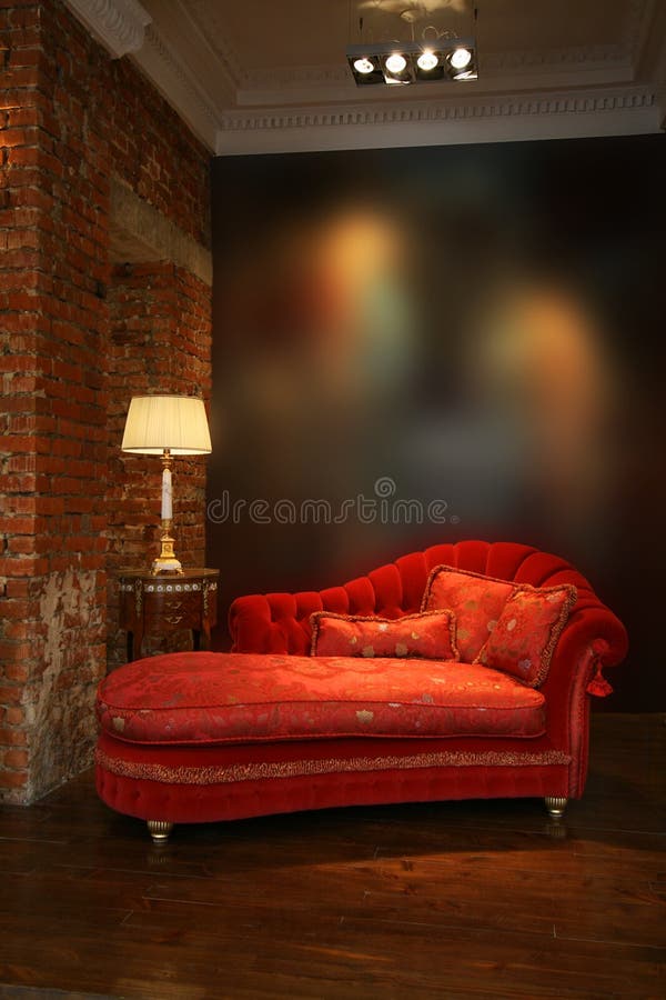 Red sofa and lamp